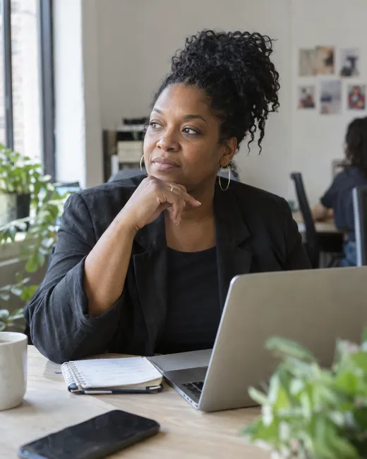 An agency owner at her desk
