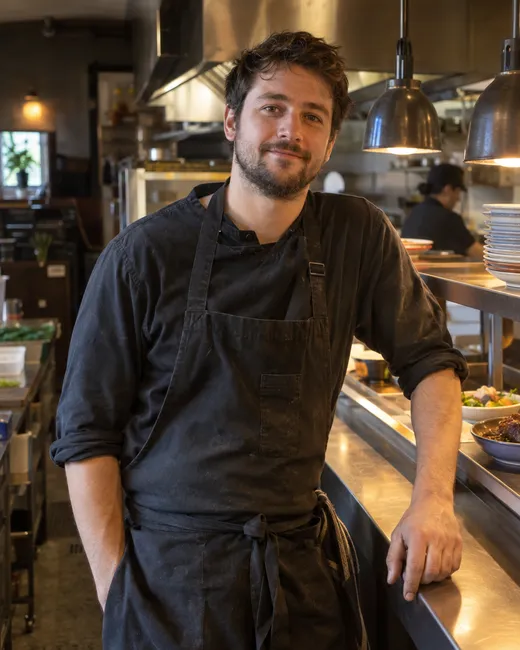 A restaurant owner in his kitchen
